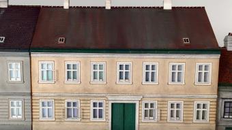 Das Vorstadthaus ziert ein Straßendiorama